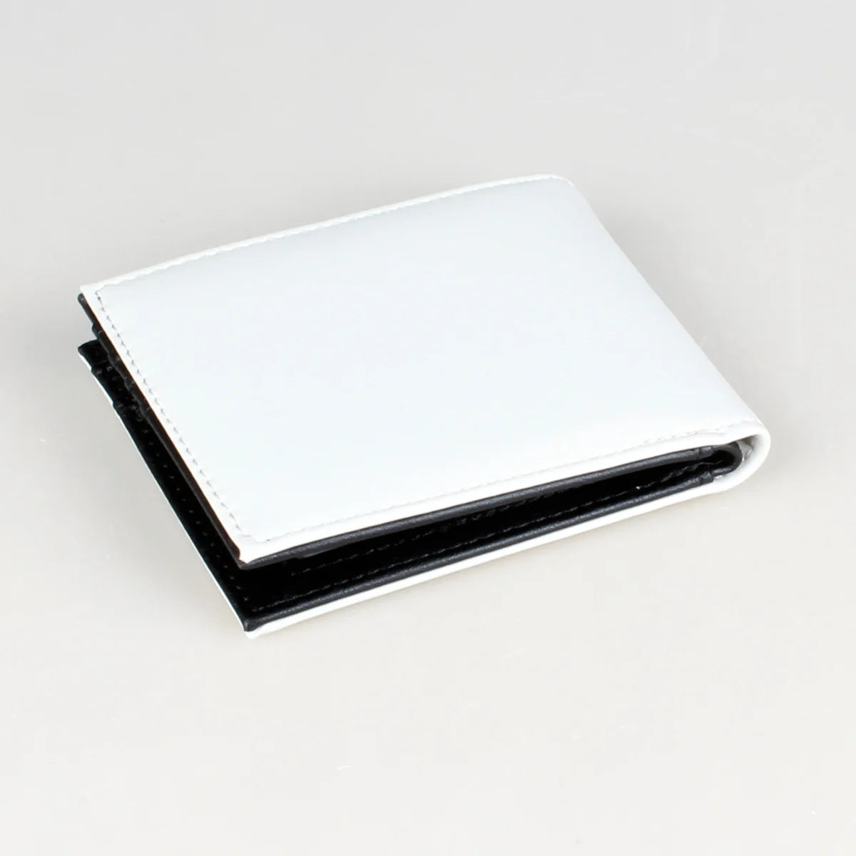 Compact game console wallet gift for video game lovers.