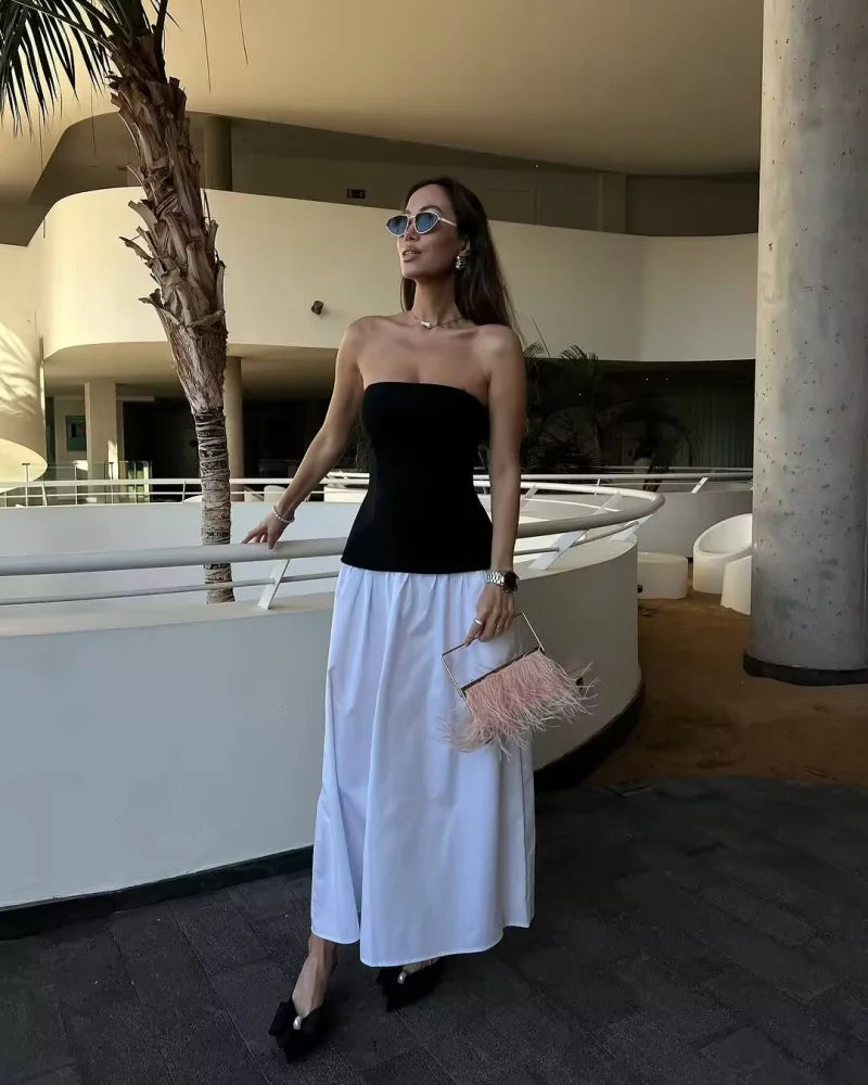 Women’s strapless party dress with color contrast patchwork, lightweight polyester fabric, perfect for spring and evening occasions.

