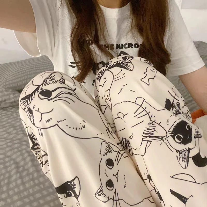 Close-up of Big Battle cat print detail on anime sleepwear pants
