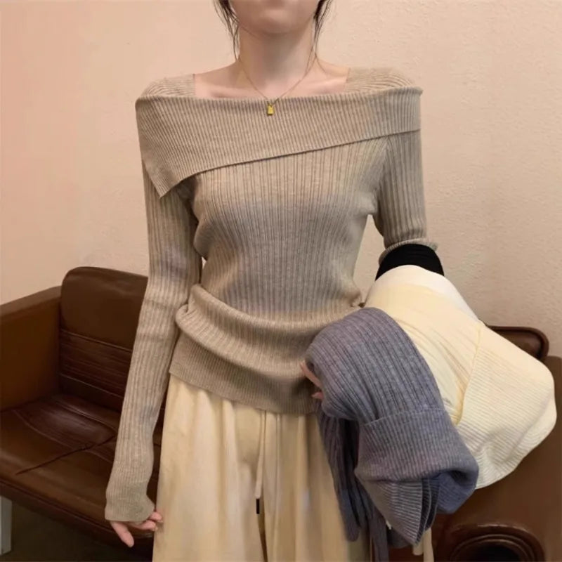 Women’s off shoulder knit sweater with slash neck and long sleeves in solid color